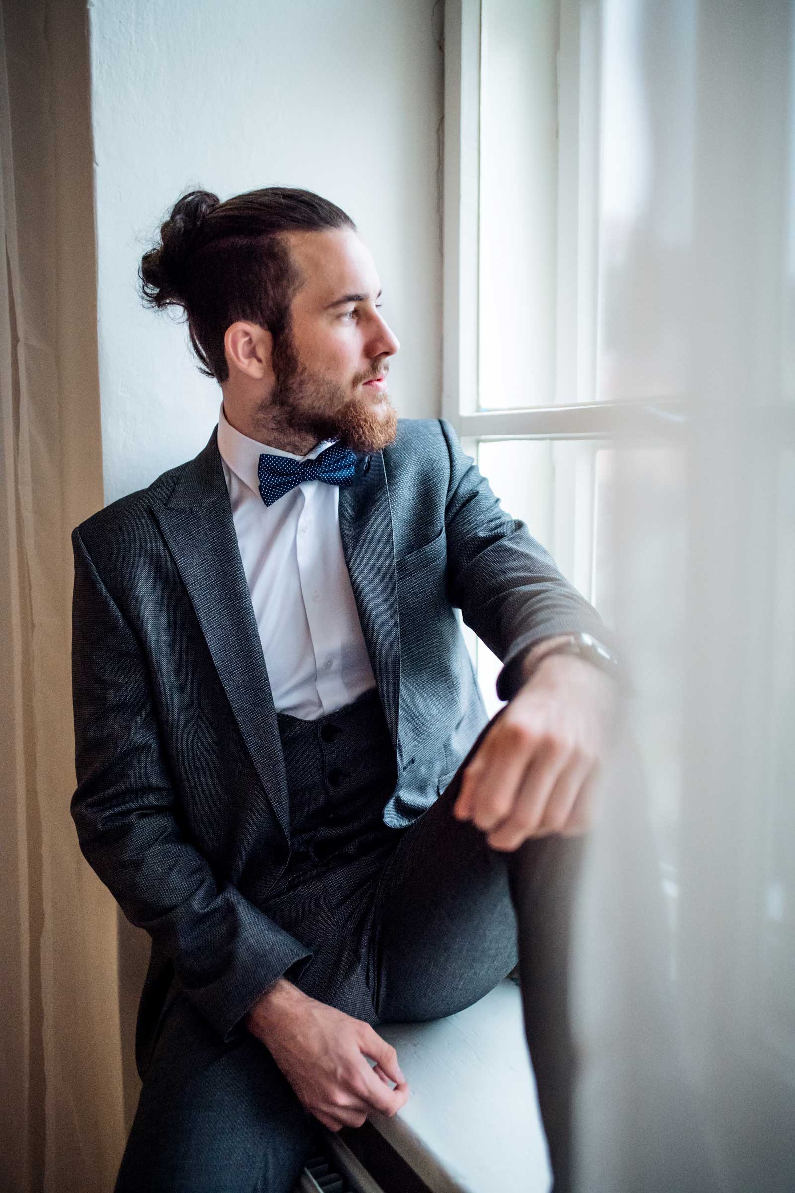 a-handsome-hipster-young-man-with-formal-suit-GFURJDS
